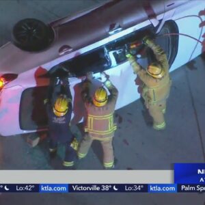 Firefighters extricate pair trapped after downtown L.A. crash
