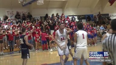 San Marcos celebrates a 54-49 win over Dos Pueblos