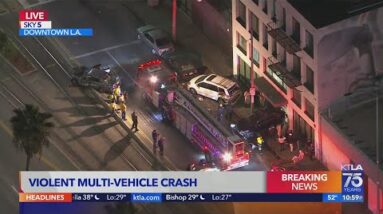 Car crash sends vehicles into building in downtown L.A.