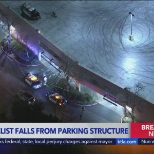 Motorcyclist falls from parking structure and dies