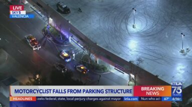 Motorcyclist falls from parking structure and dies