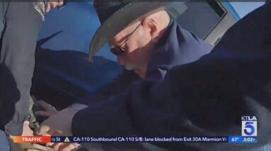 Police search for good Samaritan who helped O.C. officer in distress