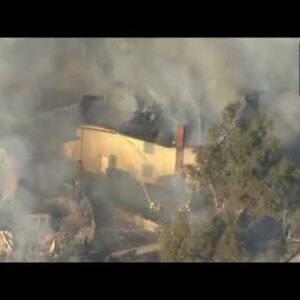 Brush fire burns 2 acres in Whittier; at least 2 home engulfed in flames