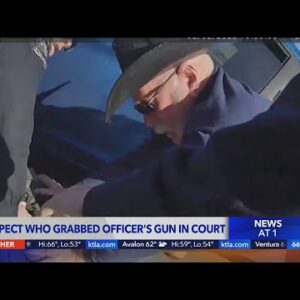 Suspect who grabbed officer's gun appears in court