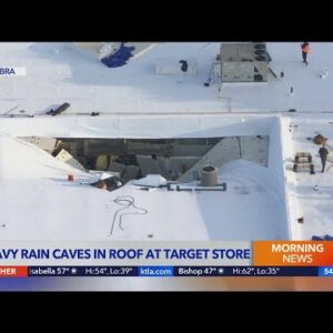 Heavy rain caves in roof at Target store
