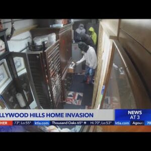 Hollywood Hills resident home watching TV as masked intruders break in