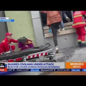 Injured civilians under attack during Russian bombing