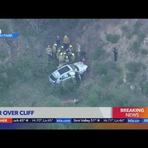 Crews work to rescue woman after vehicle goes over cliff in Griffith Park