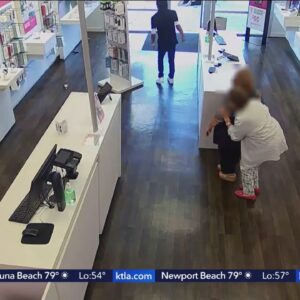 T-Mobile employee and alleged armed robbery suspect tussle at Seal Beach store