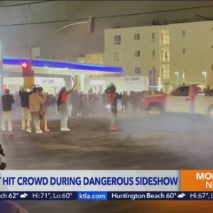 Cars nearly hit crowd during dangerous street takeover