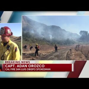 Firefighters work to put out vegetation fire on Highway 166 east of Santa Maria