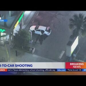 LAPD investigation car-to-car shooting in Exposition Park