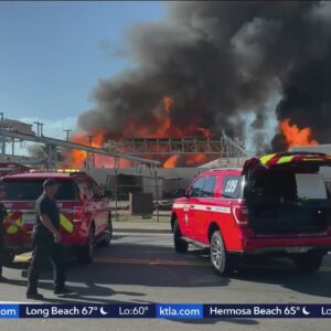 San Bernardino pallet fire burns buildings