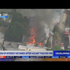 1 detained after vacant theater fire