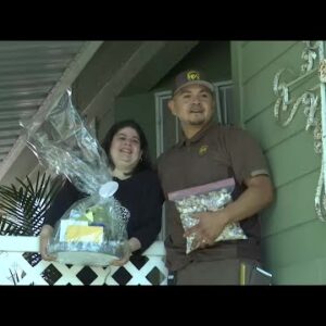 A UPS delivery driver makes a special delivery to an Oceano woman