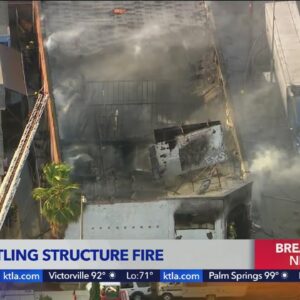 Fire burns South L.A. building