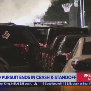 High-speed pursuit ends in crash and standoff