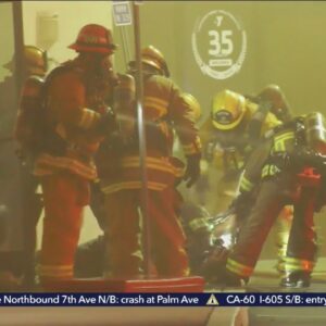 Injured firefighter pulled from burning building in Lakewood
