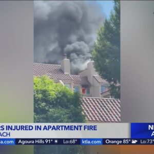 Firefighters injured in large apartment complex fire in Newport Beach