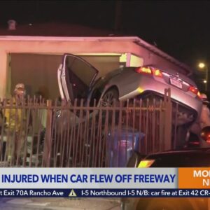 Car crashes into home after flying off 5 Freeway in East L.A.