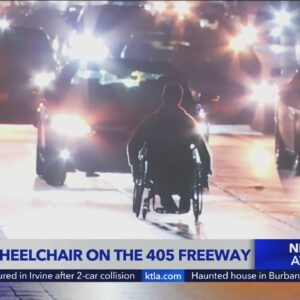 Man in wheelchair on 405 Freeway