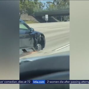 Wild video shows woman driving on Orange County freeway with 3 wheels, sparks flying