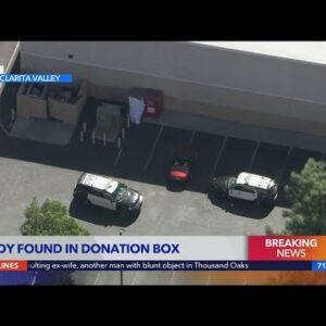 Woman’s body found in donation box