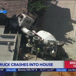 Cement truck crashes into house in Manhattan Beach