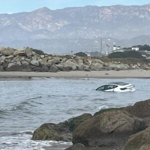 Half sunk Tesla found in the ocean in Carpinteria Monday