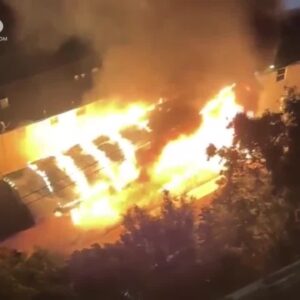 Raging fire destroys Beverly Hills carport, cars