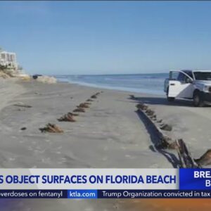 The mystery of the 80 ft structure on a Florida beach solved? + Talking on the phone while flying?