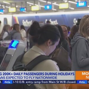 Americans prepare for big travel season