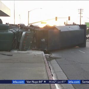 Driver in pursuit crashes into, overturns big rig in Montebello