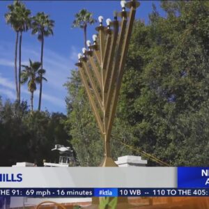 Man facing hate crime charge after video shows him throwing objects at Menorah in Beverly Hills