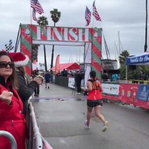 Runners don costumes for Santa to the Sea half marathon