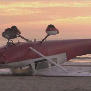 Small plane crash lands, flips on Santa Monica beach