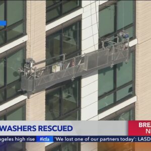 Window washers rescued after getting trapped on side of L.A. high rise