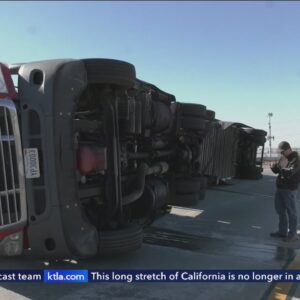 Gusty winds topple big rigs, large trees across Southern California