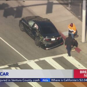2 suffer minor injuries after crash between car and Blue Line train in South L.A.