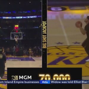 Lakers fan wins $70,000 after sinking half-court shot