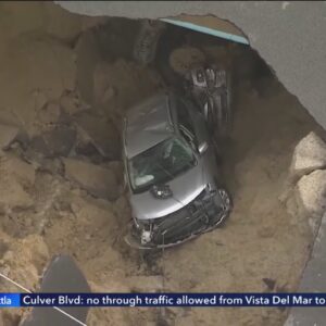 California sinkhole doubles in size after swallowing 2 cars, mother and daughter rescued