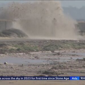 Video: Huntington Beach bicyclist swamped by spray from CalTrans truck