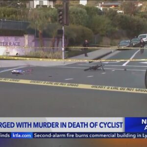 Driver charged with murder in fatal stabbing of cyclist