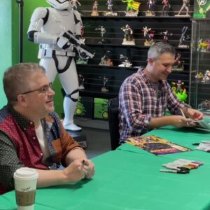 Fans line up for celebrity book signing at local comic store