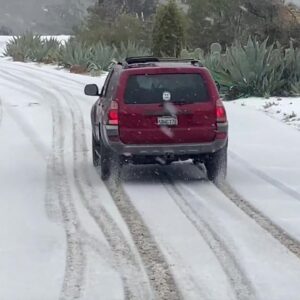 Leading edge of rare snow storm arrives in Santa Barbara hills