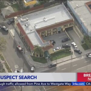 Police surround Venice motel in search of murder suspect