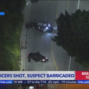3 officers shot in east Los Angeles; suspect barricaded