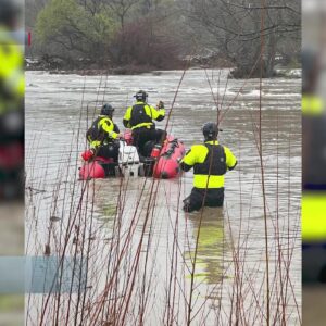 First responders perform water rescue in Paso Robles as Friday rain hits
