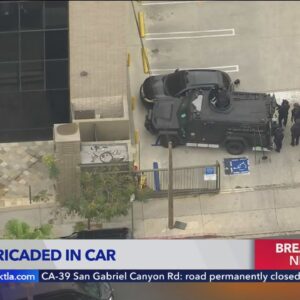 Police engage in standoff with armed man at Koreatown bank