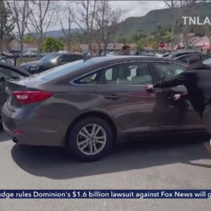 Terrifying video shows carjacker's destructive rampage at a Southern California parking lot